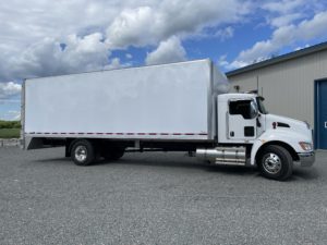 boite de camion avec élevateur